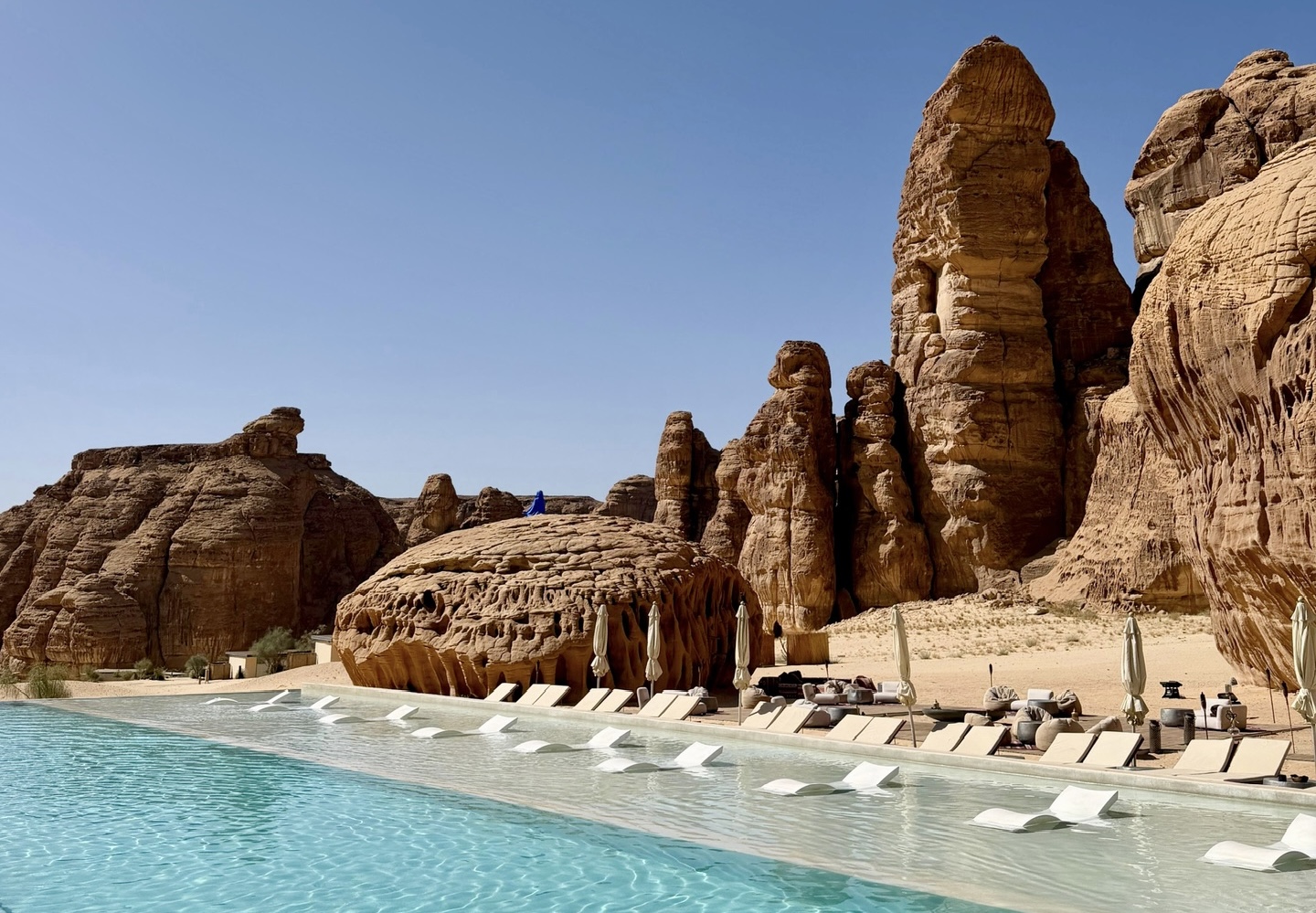 AlUla pool with desert rock